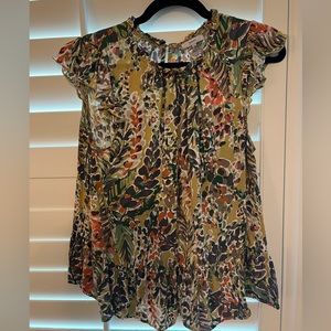 Women’s boutique sleeveless blouse with ruffles